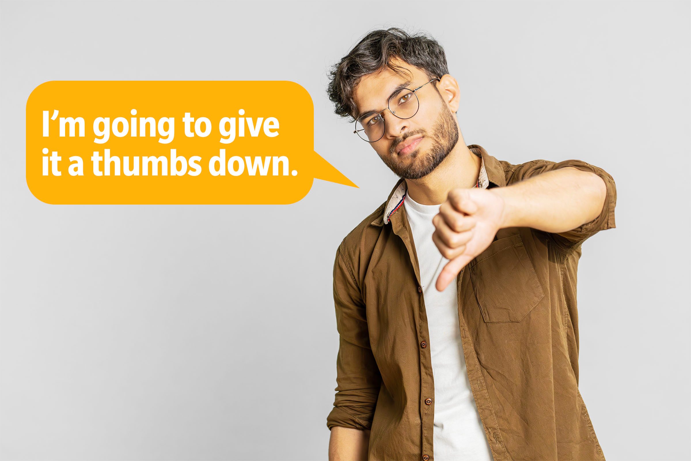 Man giving a thumbs down delivering a comeback roast, speech bubble text: "I'm going to give it a thumbs down."