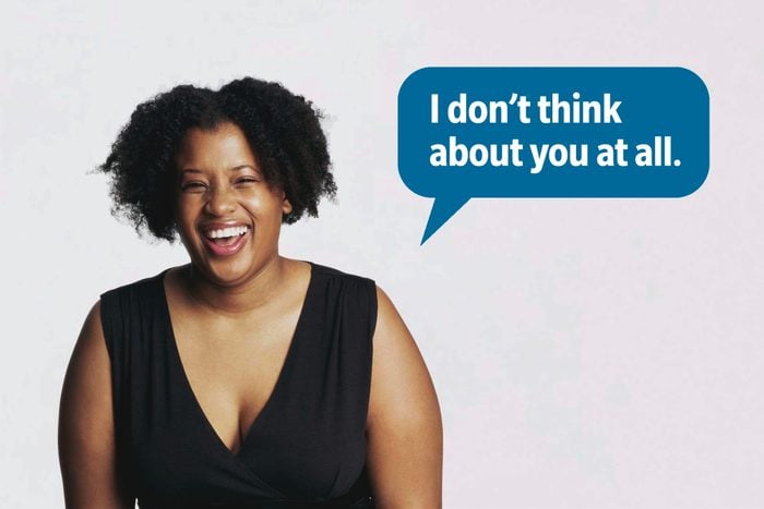 Laughing woman delivering a comeback roast, speech bubble text: "I don't think about you at all."