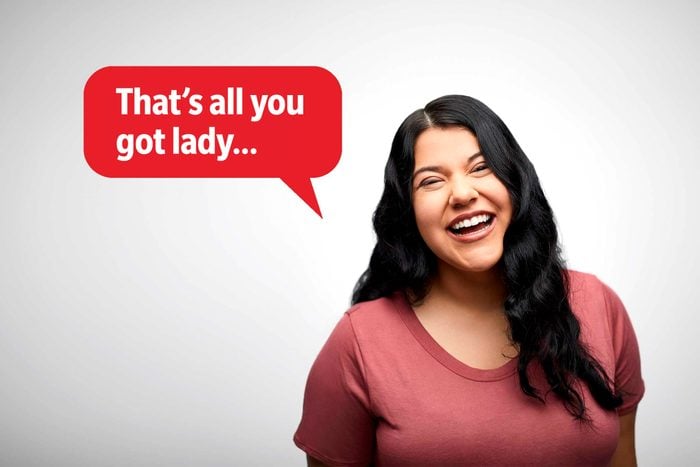 Laughing woman delivering a comeback roast, speech bubble text: "That's all you got lady..."