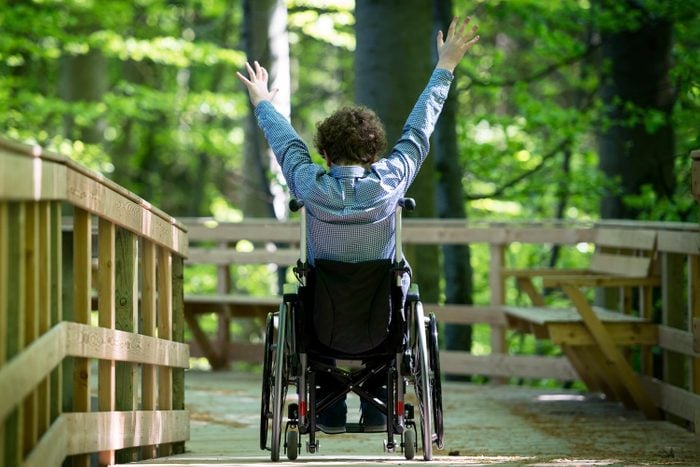 Wheelchair Bound Boy  Enjoying A Purpose Built Wheelchair Walkway