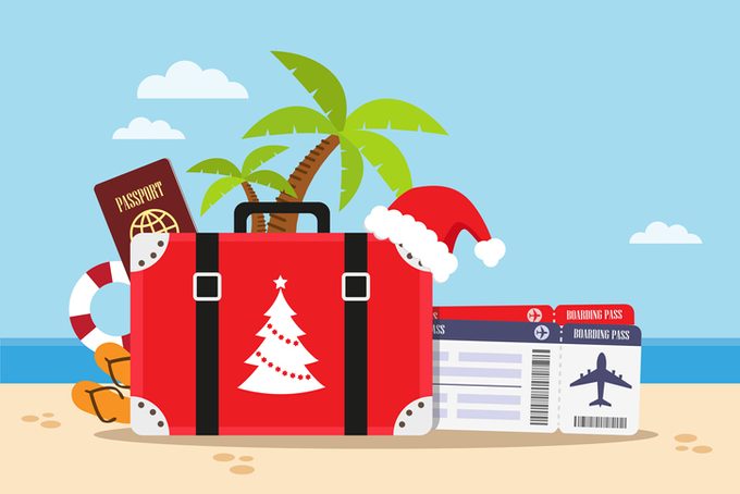 Travel on Christmas holiday Vector Illustration with a Christmas Tree Suitcase, Santa Hat, Plane Tickets, Candy Canes and Palm Trees on a Beach