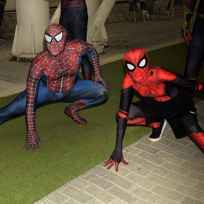 Spiderman cosplayers pose during the 29th edition of Romics...