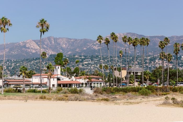 Santa Barbara skyline with beach and palm trees, California, USA