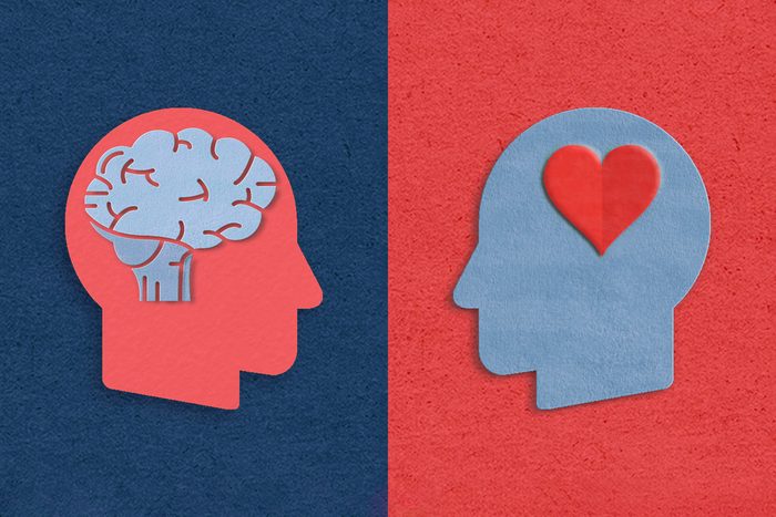 Paper craft illustration of one head with a brain and one head with a heart