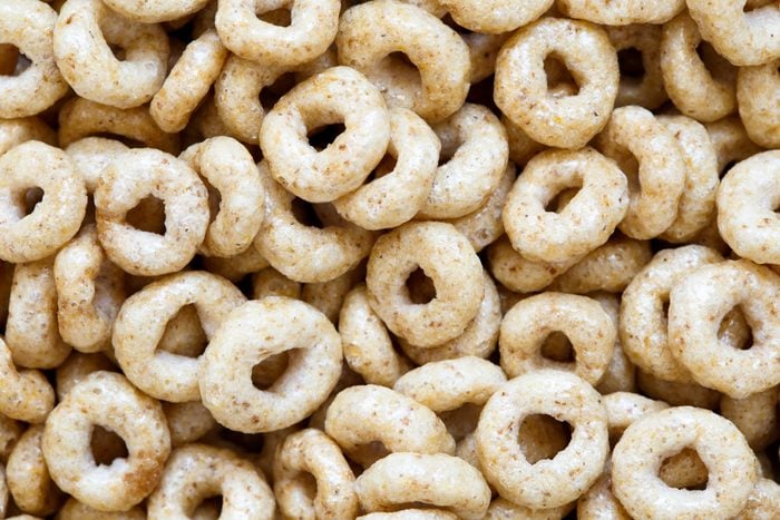 full frame close up of honey cheerios from above.