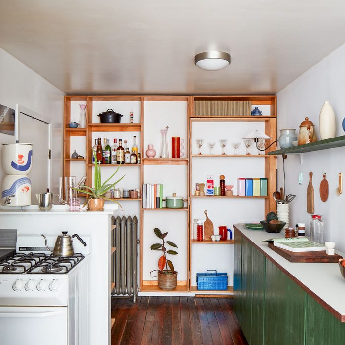 A Wall Of Shelves In Kitchen Room