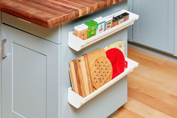 Creative Storage by adding shelves to the end of a kitchen island