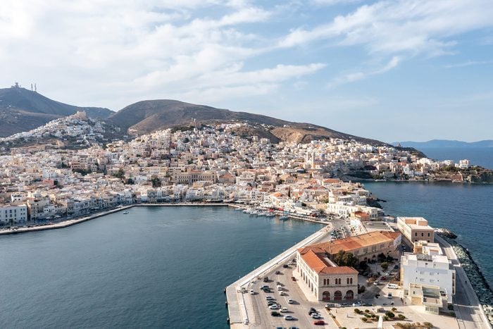 Syros island, Hermoupolis cityscape and port aerial drone view. Greece, Cyclades.