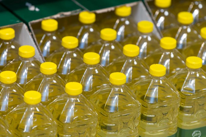 Plastic Bottles of Cooking Oil are Seen for Sale in a Supermarket in England