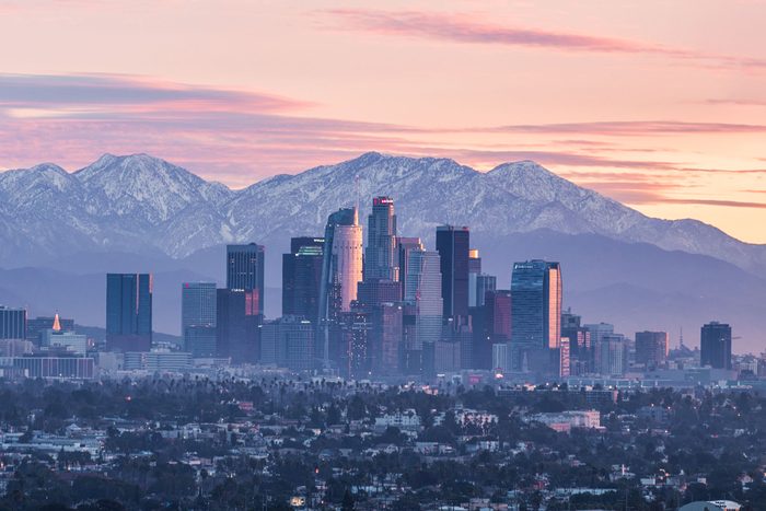 Downtown Los Angeles At Sunrise With Mountains Behind Buildings Gettyimages 636845848 Ksedit
