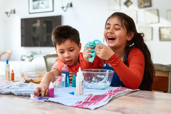 kids making slime at home during a christmas party