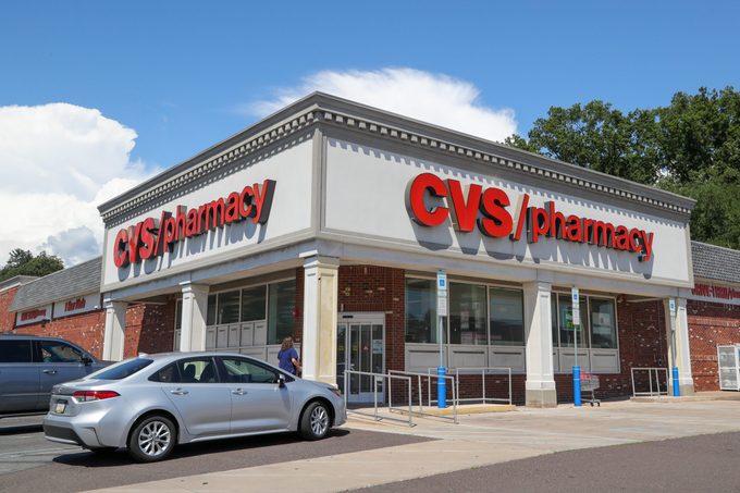 A CVS logo is displayed at one of their stores near...