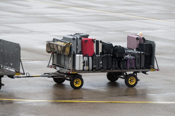 Luggage on airport cart