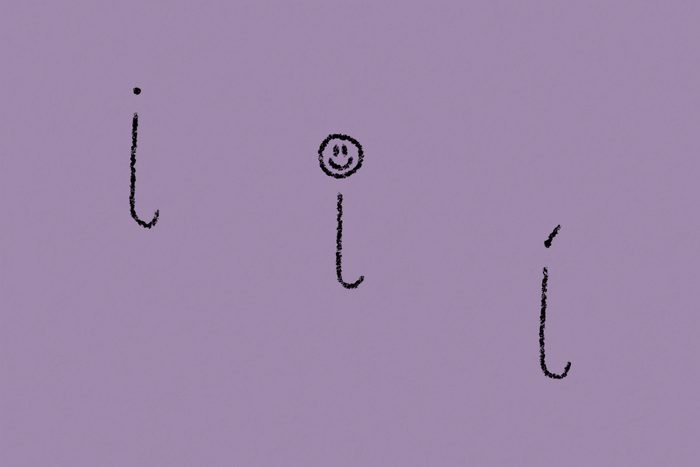Handwriting showing different ways to dot an "i"