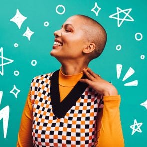 Confident short-haired woman smiling in front of a teal background. Doodles of stars, lightning bolts, bubbles