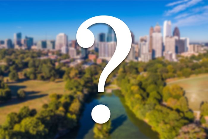 atlanta georgia skyline slightly blurred with a white question mark on top