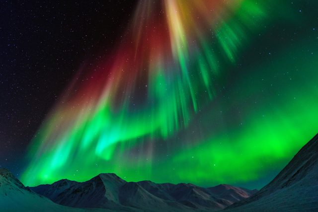 Spectacular Northern Lights (aurora Borealis) Above Brooks Range Mountains