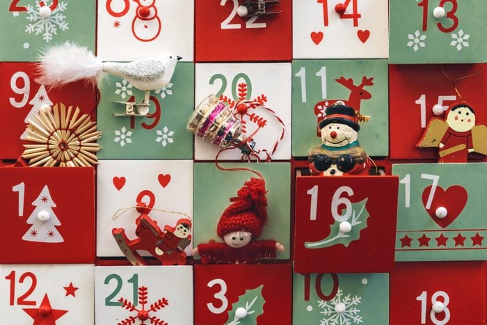 old wooden advent calendar with vintage decoration