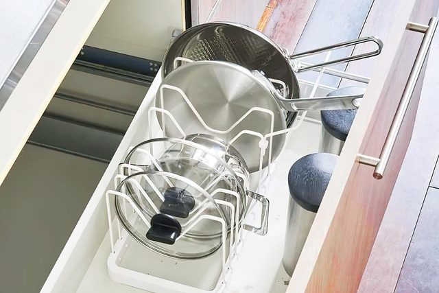drawer in kitchen with pot lids in vertical storage