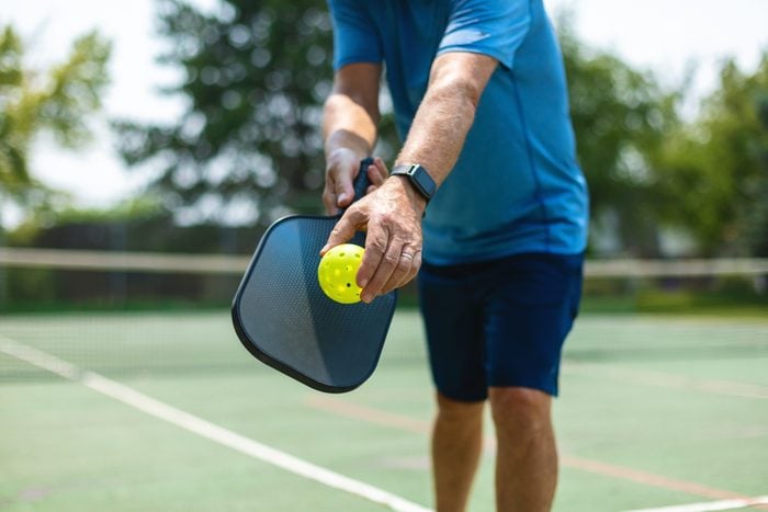 Mature Adult Male Playing Pickle Ball Photo Series