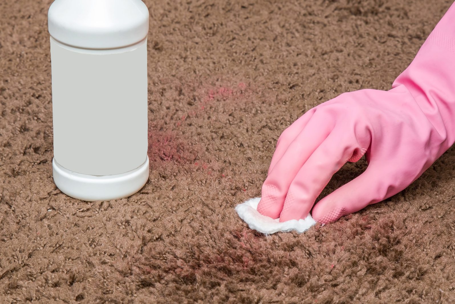 Nail polish stain cleaning with special chemical liquid. Carpet cleaning.