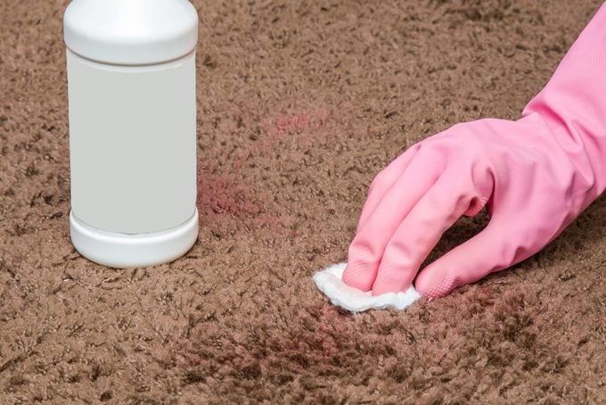 Nail polish stain cleaning with special chemical liquid. Carpet cleaning.
