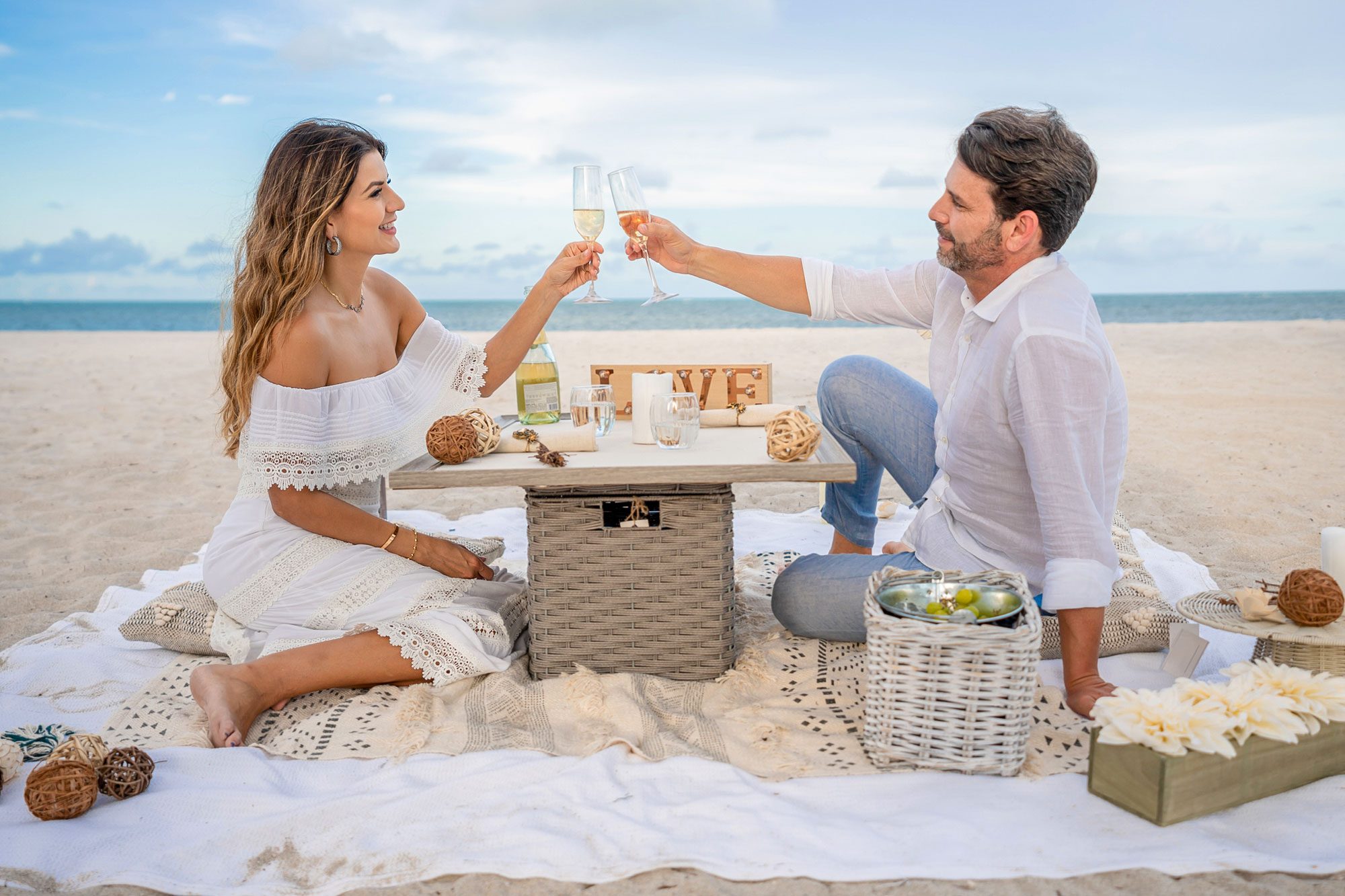Loving Couple On A Romantic Dinner At The Beach