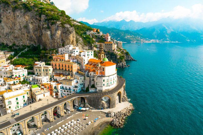 Aerial View Of The Stunning Amalfi Coast With Road And The Atrani Town With Arched Road In Italy
