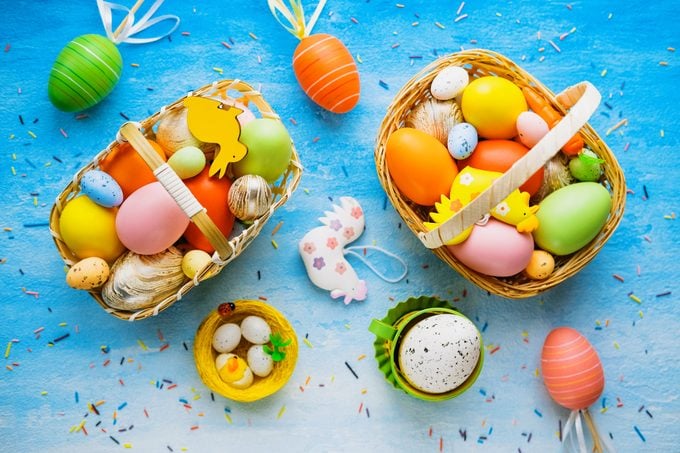 Easter baskets, eggs, toys and a mug.