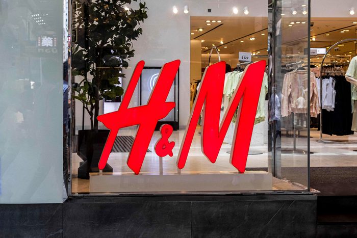 Iconic red H&M initials in a store window