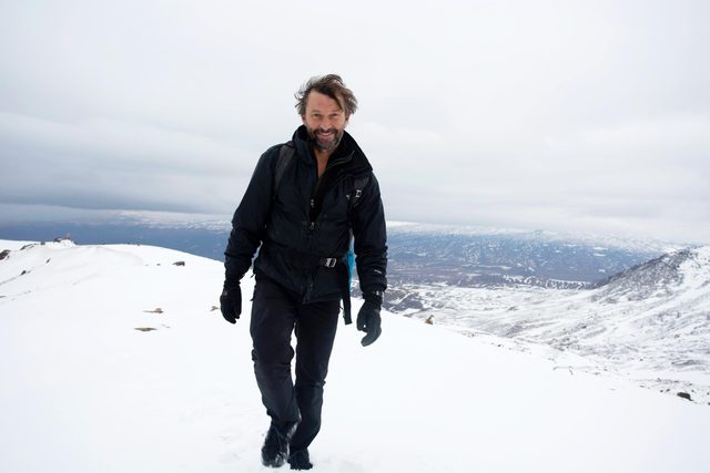 Boris Kester walking on a mountain