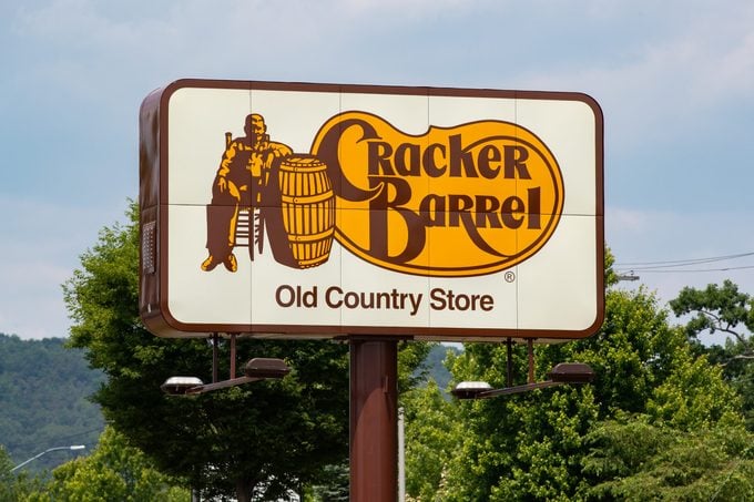 The Cracker Barrel Old Country Store logo is seen outside...
