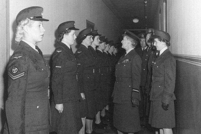 Hallway inspection of members of the Women's Army Corps at Western Air Command ca. 1942