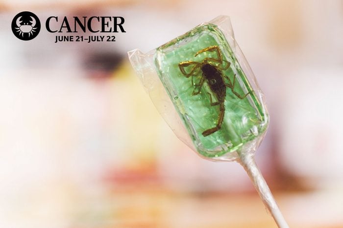 bug lollipop with cancer zodiac in upper left corner