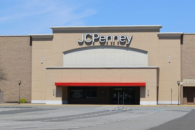 A general view of an empty parking lot in front of a closed JC Penney store