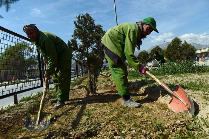 Afghan laborers preparing the ground on earth day