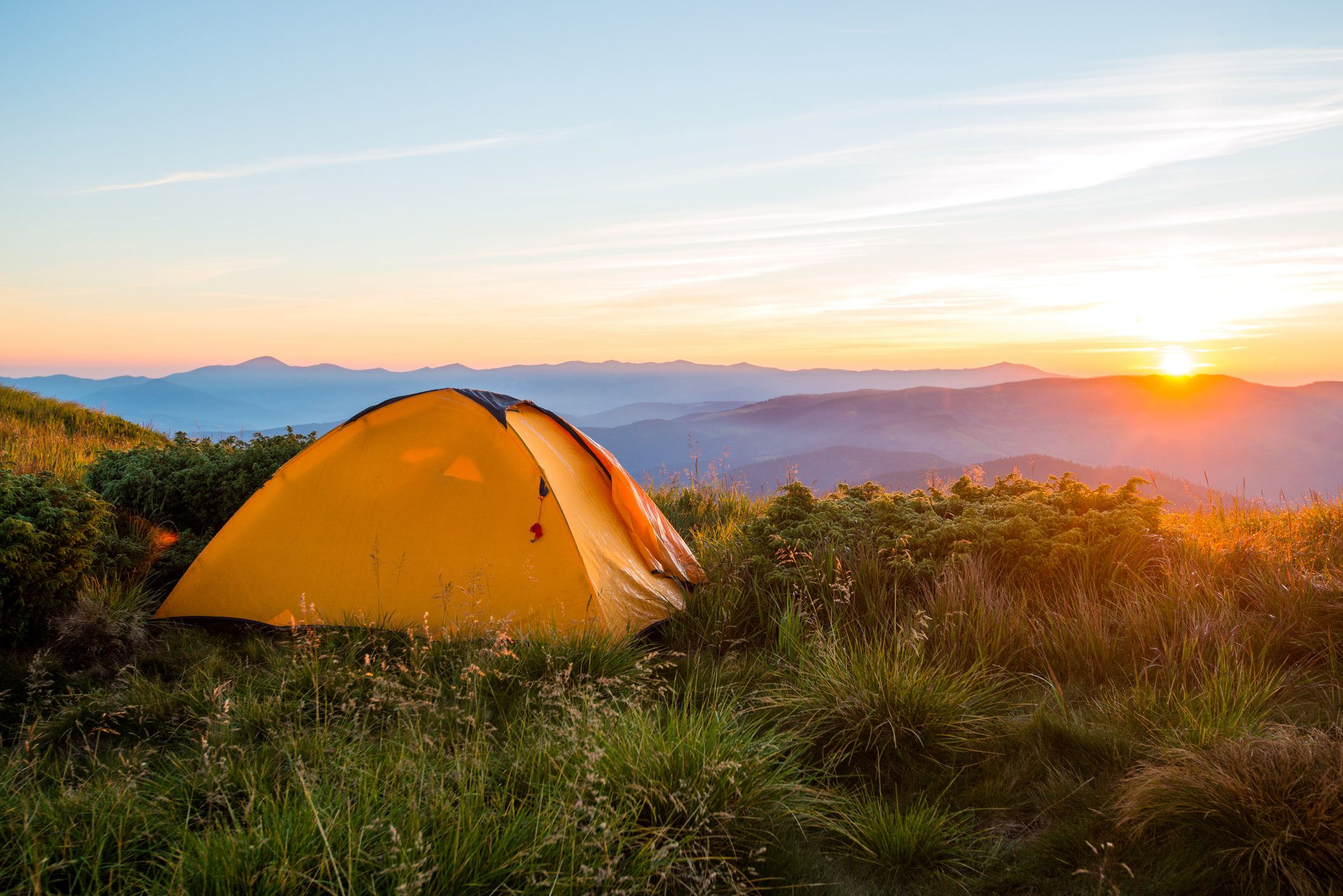 Mountain tent, sunrise on the ridge, tracking